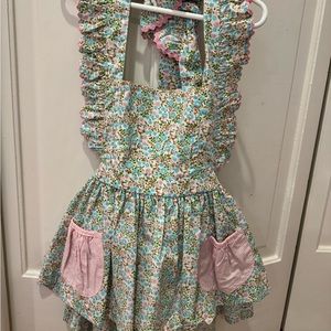 Shrimp & Grits sleeves halter top. Ties in back. Size 6. Pink and blue floral.